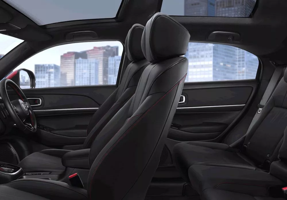 Stylish Black Interior and Leather-Trimmed Seat with Red Stitches